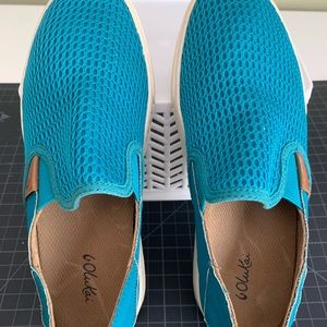 Ladies teal OluKai loafers.